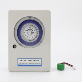 Front view of a TB-388 100-240V AC timer next to a 1.2V Ni-MH rechargeable backup battery.